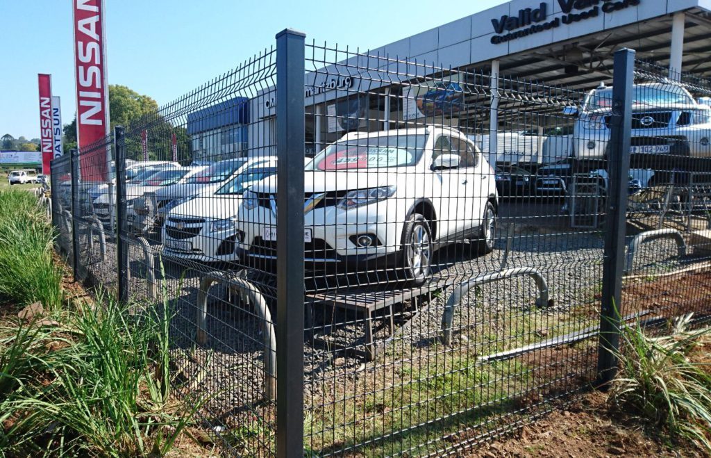 Galvanised rigid vista-style mesh panel fencing.
